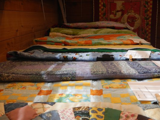 Quilts for infants and babies are a popular purchase item at the Water Mill Museum's Annual Quilt Show and Sale. CAREY LONDON
