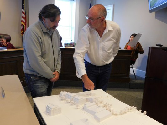 Andre Kikoski, project architect, and David Berridge, ARB board member, discussed changes to the townhouse project.   ELIZABETH VESPE