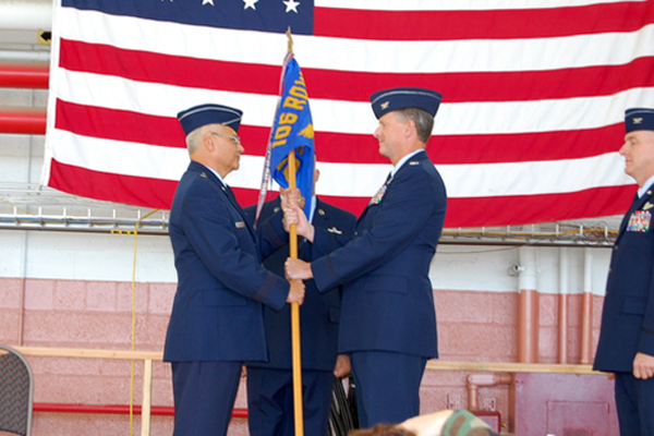 Brig. Gen. James Kwiatkowski, commander of the New York State Air National Guard, stands with outgoing commander Col. Michael F. Canders during the change of command ceremony on Sunday, October 4 at Gabreski Airport.