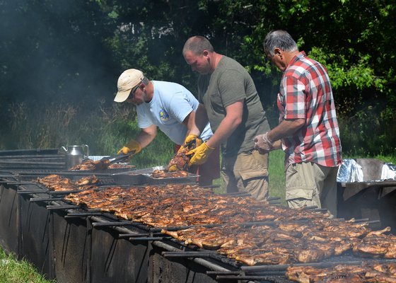 The East Hampton Lions Club held its annual chicken barbecue on the grounds of the American Legion Post in Amagansett on Saturday. Bob Pucci, StepHen Lynch Jr. and Michael Bassett helped out at the hot grill. KYRIL BROMLEY