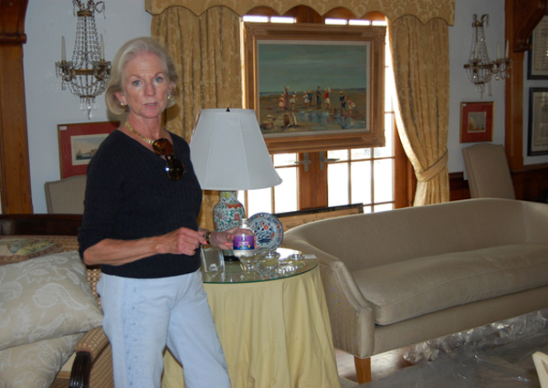 Ann Grimm discusses furniture for sale at the Decorators-Designers-Dealers show, to be held on Saturday, June 5. Ms. Grimm is the design and decoration chairman for the event. JESSICA DINAPOLI