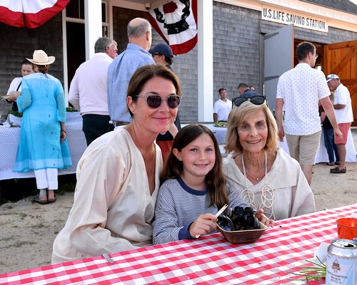 The fifth annual Amagansett Life Saving and Coast Guard Station Lobster Bake fundraiser was the hot ticket in town last Saturday. Kelly Fagan, Raleigh Sipkin and Phyllis Briskin were among those attending. KYRIL BROMLEY
