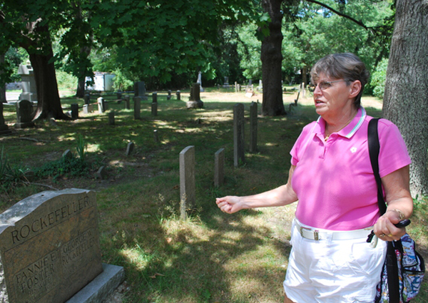 Carol Combes in the cemetery behind the East Quogue United Methodist Church.