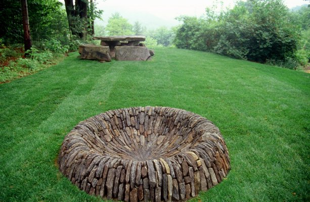 Dan Snow Firebowl, local natural stone, private collection, Dummerston, Vermont. COURTESY PETER MAUSS/ESTO