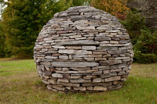 Dan Snow Stone Globe II, natural stone, private collection, Newfane, Vermont. COURTESY PETER MAUSS/ESTO