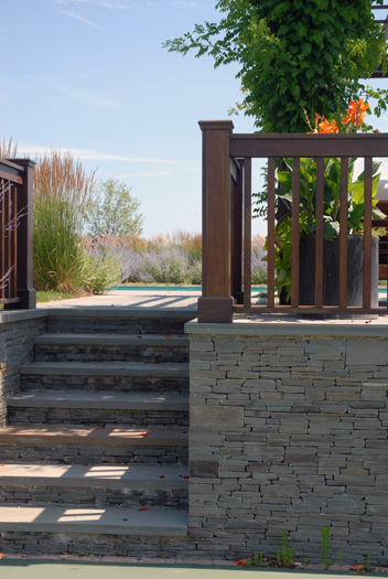 Dry stack stones are a popular choice for around the pool. PHOTO COURTESY M.O.E. MASONRY