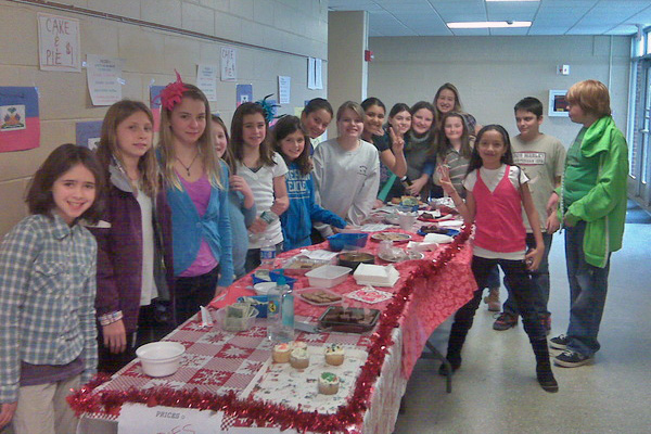 Students of East Hampton Middle School have started various projects and fund-raising activities in order to raise money to help the victims of the earthquake in Haiti.  On Friday, January 22, The 6th Grade Book Club made $233 at their bake sale.