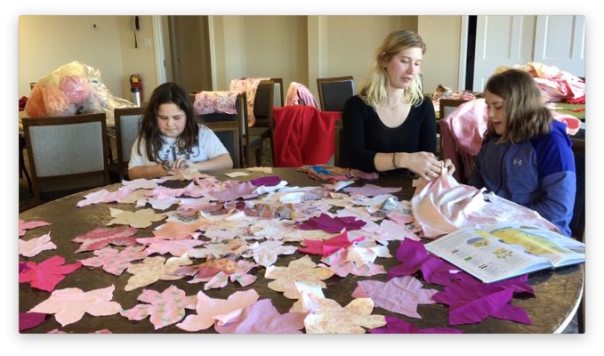 Lilly and Gracey Rossi and Aubrey Roemer cutting out flowers. PHOTO COURTESY OF LIZ BERTSCH