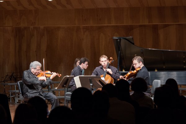 Maestro Itzhak Perlman conducts the 2012 SMS Orchestra. ANNIE WATT