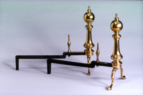 Reproductions of a set of 18th century Queen Anne andirons made by the Murdock Parlor Grate Company in Boston, which was in business from 1875 to 1935. COURTESY EAST HAMPTON HISTORICAL SOCIETY