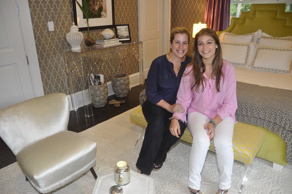 Designer Barbara Page with her daughter, Cece Glatt, in the upstairs bedroom of the Hampton Designer Showhouse. MICHELLE TRAURING