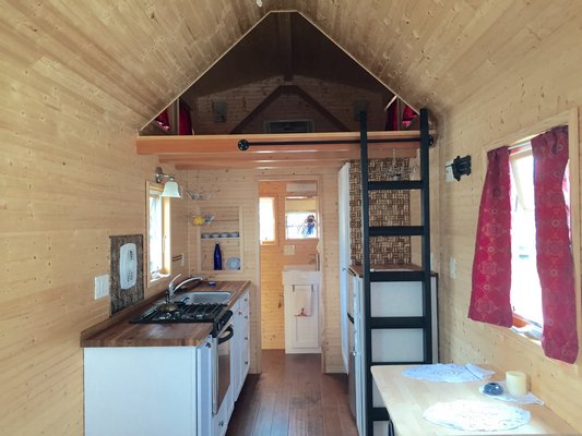 A view of the kitchen and loft. COURTESY DEBRA PETERS