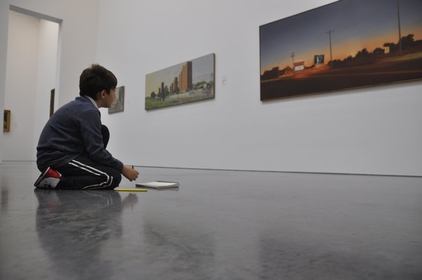 Brandon Braccia sketches Howard Kanovitz's iconic "Hamptons Drive-In." MICHELLE TRAURING