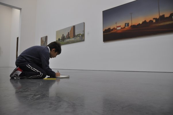 Brandon Braccia sketches Howard Kanovitz's iconic "Hamptons Drive-In." MICHELLE TRAURING