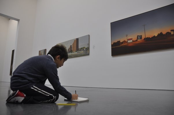 Brandon Braccia sketches Howard Kanovitz's iconic "Hamptons Drive-In." MICHELLE TRAURING