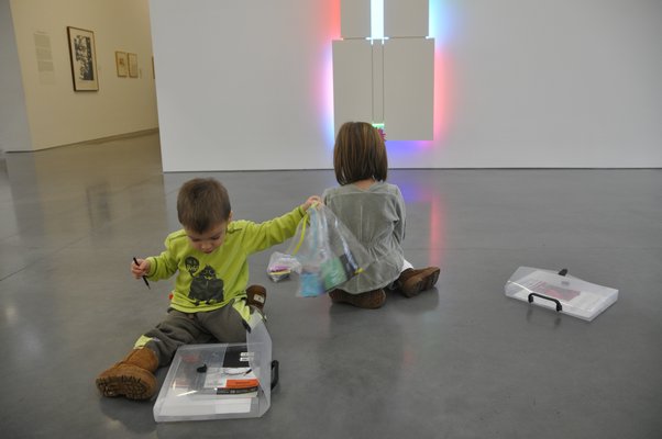Marc-Andre and Adriana Tapfer use their Go-Packs at the Parrish Art Museum. MICHELLE TRAURING