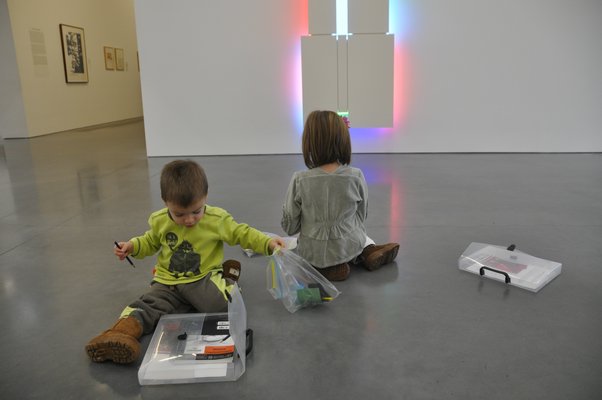 Marc-Andre and Adriana Tapfer use their Go-Packs at the Parrish Art Museum. MICHELLE TRAURING
