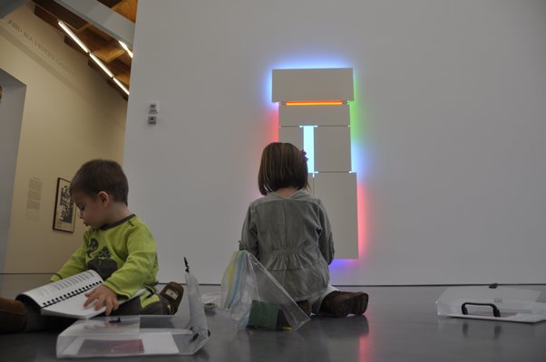 Marc-Andre and Adriana Tapfer use their Go-Packs at the Parrish Art Museum. MICHELLE TRAURING