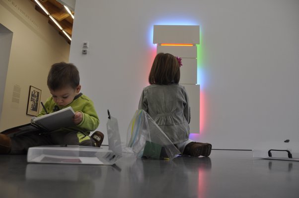 Marc-Andre and Adriana Tapfer use their Go-Packs at the Parrish Art Museum. MICHELLE TRAURING