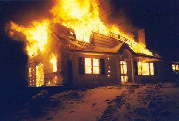 A flue fire ripped through a home on Godfrey Lane in Remsenburg in 2005. COURTESY JOHN RANKIN