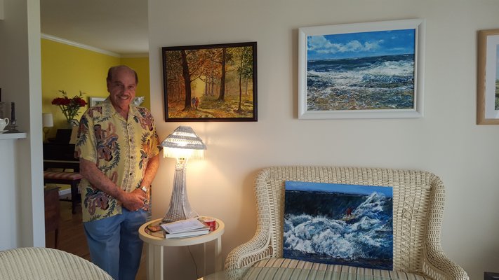 Harvey Feinstein with his paintings. BRIDGET LEROY