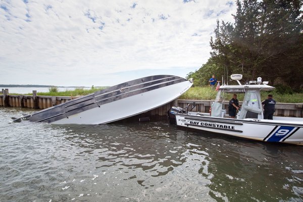Seen Sunday, the 39-foot boat that crashed into a North Haven dock on Saturday night and overturned.