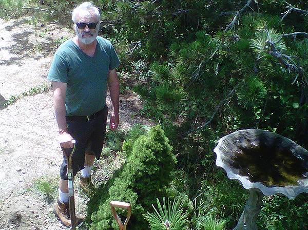 Warren Schultz at work in the garden.   LAUREN EZERSKY