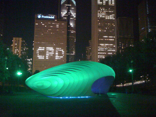 Zaha Hadid's house of the future lit up at night in Millennium Park.