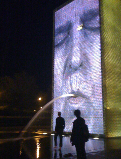 Millennium Park at night; monumental art engaging the general public.