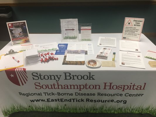 A table of information given out by Stony Brook Southampton Hospital at the Tick Talk at Hampton Bays Public Library on July 11.