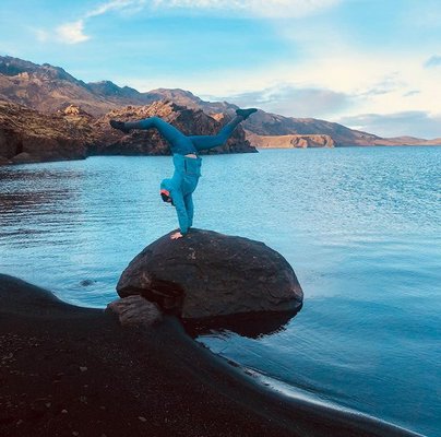Dana Barret does a handstand in Iceland in October 2018.