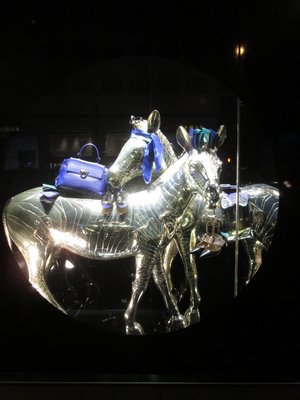 Windows at Cartier include life-sized metallic zebras and giraffes, swathed in accessories. MARSHALL WATSON