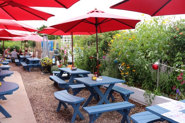 Outdoor seating and summer flower gardens at the Lobster Roll. Jack Sullivan