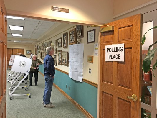 Voting in Hampton Bays on Tuesday morning.