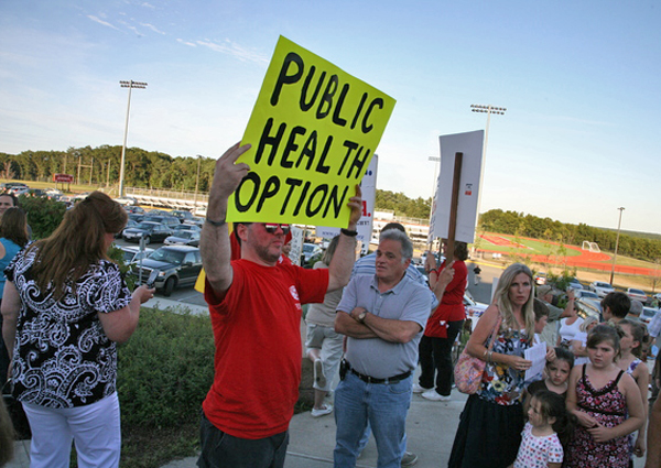 Hundreds of protesters for and against health care reform gathered at Sachem High School East in Farmingville on Thursday