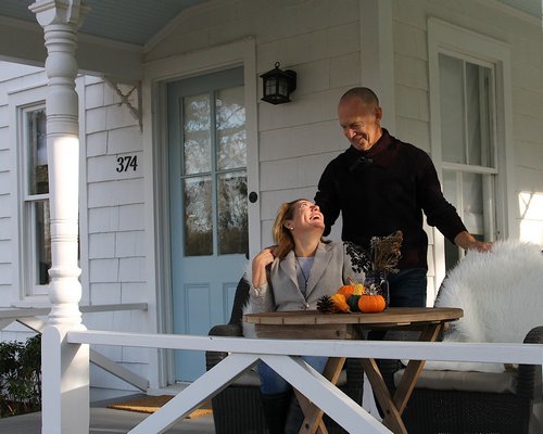 The Greenfields on their front porch in Amagansett. KRYIL BROMLEY