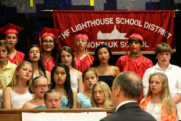 The school chorus, with Steven Skolberg directing, performs. KYRIL BROMLEY