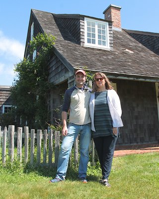 Luke Pierre and Kathryn Nadeau of the Montauk Historical Society, which manages Second House in Montauk, seen behind them. KYRIL BROMLEY