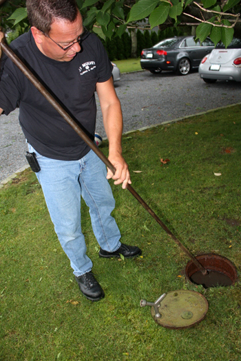 Dave Alberti, a master plumber at J.P. Mulvey, demonstrates how to winterize a home.