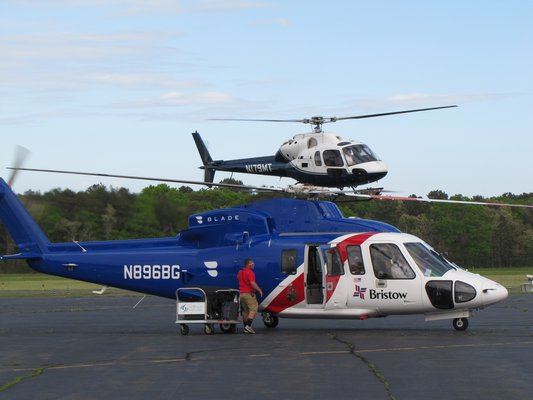 Consultants for the town said that overall traffic levels decreased slightly at East Hampton Airport in 2018 but that the number of helicopter flights continued to climb and have increased nearly 50 percent since 2016. Michael Wright