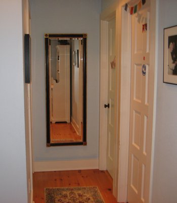 "A mirror at the end of a long hallway gives the feeling of distance instead of the feeling like you're walking into a wall." COURTESY CANDACE VORHAUS