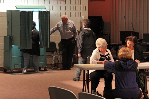 Voting at East Hampton High School on Tuesday.