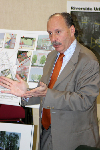 Larry Rosenbloom, an architect from Manhattan, explains the plans for a new development south of County Road 39 in Tuckahoe.