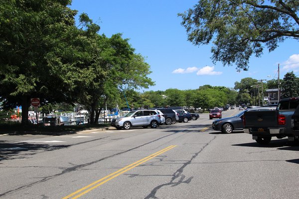 East Hampton Town will help Sag Harbor Village fund the installation of permeable pavement along parts of Bay Street's on-street parking areas to catch stormwater runoff before it reaches the harbor's waters. Kyril Bromley