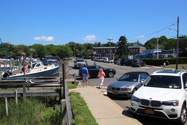 East Hampton Town will help Sag Harbor Village fund the installation of permeable pavement along parts of Bay Street's on-street parking areas to catch stormwater runoff before it reaches the harbor's waters. Kyril Bromley