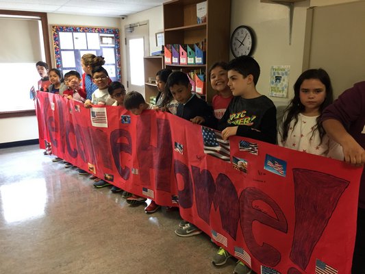 Members of the 106th Rescue Wing at Gabreski Airport visit with students at Tuckahoe School on May 10 to thank them for sending letters and care packages when the Airmen were deployed.