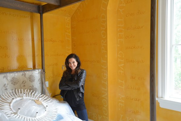 Iris Dankner in one of the recently completed rooms at the Holiday House Hamptons. ALEX GOETZFRIED