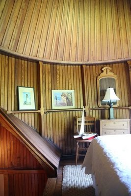 A trap door is one of two egresses to a conical-celinged bedroom which is between the second and third stories of the McBride Quiogue home. LB LOWNES FOR JENNY LANDEY PRODUCTIONS