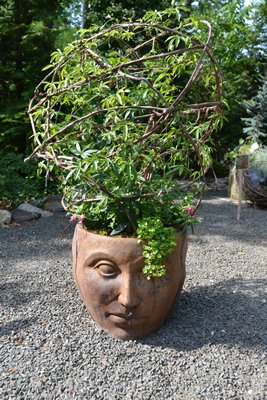 "Earth Dreaming Heaven" by Elaine Peterson Moontauk at the "Planters On + Off the Ground VI" invitational at LongHouse Reserve in East Hampton. ALEX GOETZFRIED