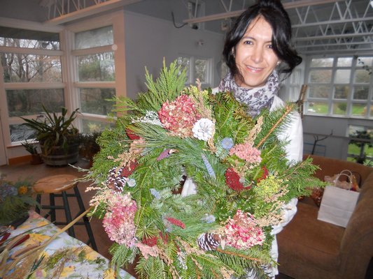 Lorena Strunk made a wreath at Bridge Gardens last year. COURTESY PECONIC LAND TRUST